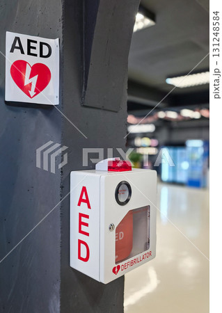 AED or Automated External Defibrillator installed on wall in Sports Gym as first aid in heart attack situation. AED or Automated External Defibrillator installed on wall in Sports Gym as first aid in heart attack situation. 131248584