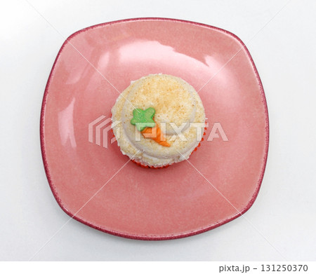 Cupcake on plate Cupcake on plate 131250370