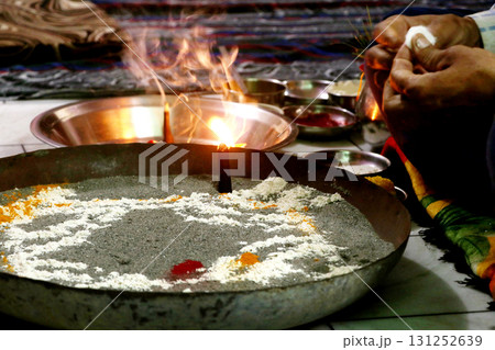 Burning Oil Lamp with Incense in Temple Ritual Burning Oil Lamp with Incense in Temple Ritual 131252639