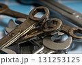 Mechanic tools wrenches lying on checkered workbench surface Mechanic tools wrenches lying on checkered workbench surface 131253125