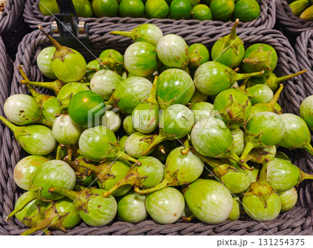 Fresh Green Vegetables in Baskets at a Local Market Display 131254375