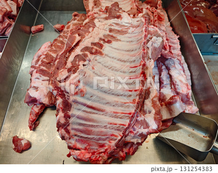 Fresh Pork Cuts on Display at Butcher Shop for Purchase and Cooking 131254383