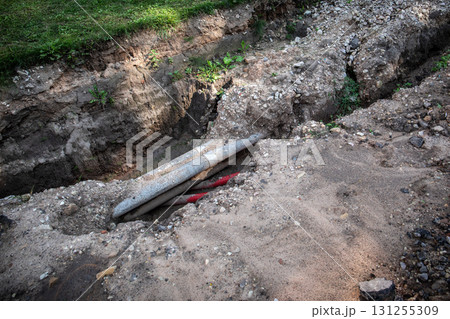 Underground Utility Pipes Exposed During Street Excavation Underground Utility Pipes Exposed During Street Excavation 131255309