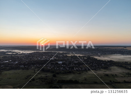 Aerial Sunrise View Over Foggy Countryside 131256635