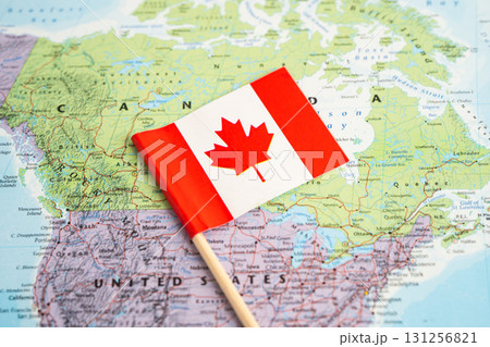 Bangkok, Thailand July 13, 2025 Canada flag on world map. Bangkok, Thailand July 13, 2025 Canada flag on world map. 131256821