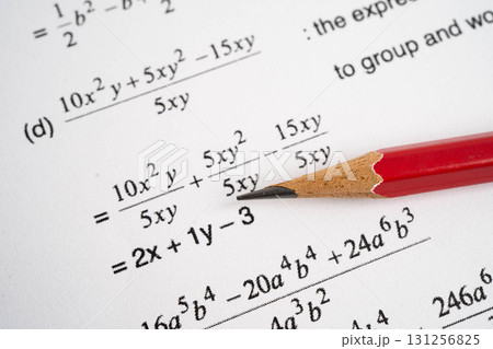 Pencil on mathematic formula exercise test paper in education school. Pencil on mathematic formula exercise test paper in education school. 131256825