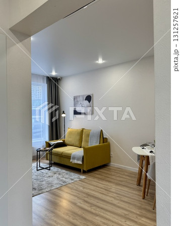 modern living room in a stylish interior of a new apartment with designer renovation 131257621