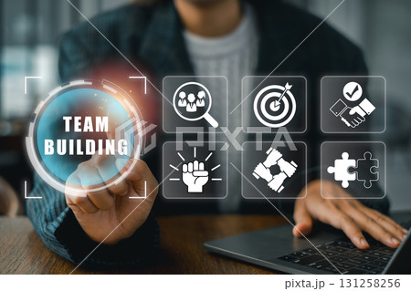 Engaging team building concept featuring digital icons symbolizing collaboration, unity, and teamwork in a modern workspace. Engaging team building concept featuring digital icons symbolizing collaboration, unity, and teamwork in a modern workspace. 131258256