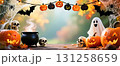 A frame consisting of a garland of Halloween elements: pumpkins, a black cauldron, skulls, cobwebs and spiders, bats, and cheerful ghosts 131258659