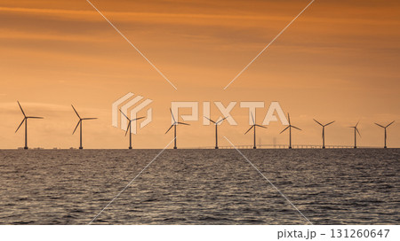 Wind turbines power generator farm along coast sea Wind turbines power generator farm along coast sea 131260647