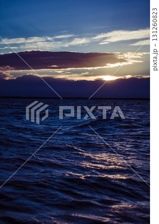 Beautiful sunset on the ocean sea 131260823