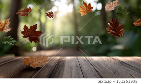 Autumn leaves drift gently above a wooden table in a peaceful outdoor area under a clear sky 131261938