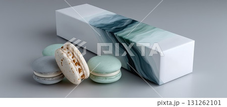 A person holds a beautifully wrapped box filled with colorful macarons, showcasing a warm and inviting atmosphere. A person holds a beautifully wrapped box filled with colorful macarons, showcasing a warm and inviting atmosphere. 131262101