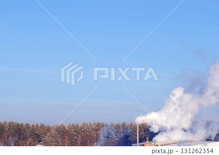 White smoke from the pipes of plant on the outskirts of industrial district. 131262354