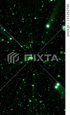 Green glowing particle rays emitting from a central point, creating a burst effect against a dark background Green glowing particle rays emitting from a central point, creating a burst effect against a dark background 131262580
