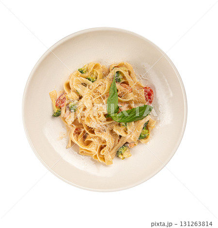 Isolated fettuccine pasta with broccoli and sauce Isolated fettuccine pasta with broccoli and sauce 131263814