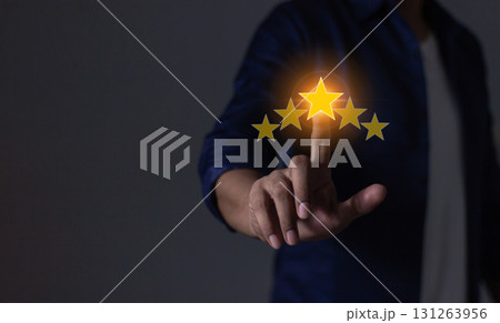 Happy Customer, Young Man hand touching five star to review and give 5 stars  131263956