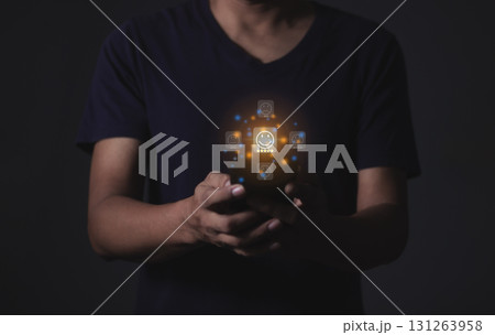 Customer Review, Young Man hand holding Smart Phone with five star to review and give 5 stars  131263958