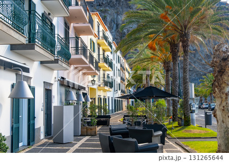 View of Ponta do Sol, a small touristic village in the city of Funchal, main avenue facing the sea, with residential buildings, Madeira Island, Portugal 131265644