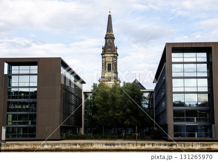 Historical Tower Stands Between Modern Buildings in Copenhagen Denmark Historical Tower Stands Between Modern Buildings in Copenhagen Denmark 131265970