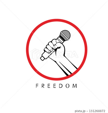 A hand holds a microphone up. 131268872