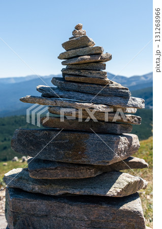 Meditative stack of stones in the stillness of the mountains. Balanced stack of stones	 131268966