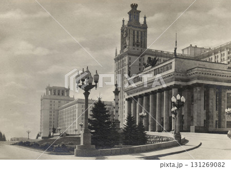 Moscow, Russia - July 22, 1953: The Moscow State University high-rise building on Lenin Hills. The main entrance. Retro postcard. Inscriptions in Russian. 131269082