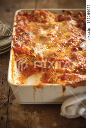 Homemade Italian Lasagna with Cheese and Meat Sauce in Baking Dish 131269621