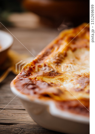 Homemade Italian Lasagna with Cheese and Meat Sauce in Baking Dish 131269699