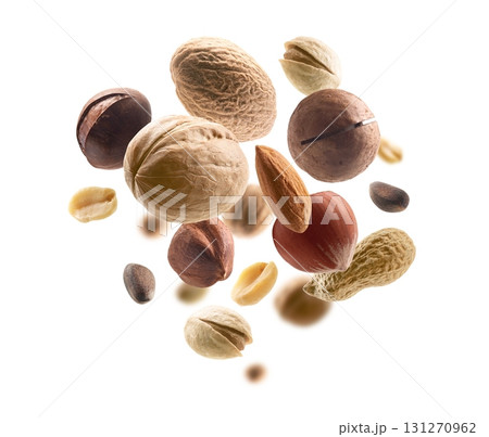 Various nuts levitate on a white background Various nuts levitate on a white background 131270962