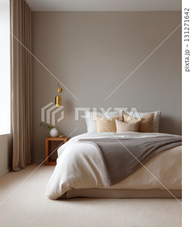 Calm and cozy modern bedroom interior design featuring minimalist aesthetic. neutral color palette with comfortable bed creates serene and tranquil atmosphere for home 131271642