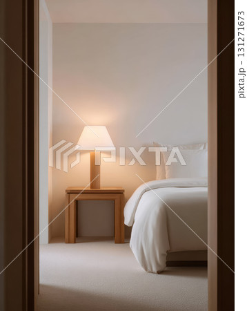 Serene bedroom interior with warm glowing lamp on wooden nightstand. cozy and minimal home furniture design creating calm and peaceful atmosphere for relaxation Serene bedroom interior with warm glowing lamp on wooden nightstand. cozy and minimal home furniture design creating calm and peaceful atmosphere for relaxation 131271673