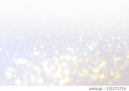 Silver, white and golden blur bokeh in New Year eve and copy space. Abstract background Silver, white and golden blur bokeh in New Year eve and copy space. Abstract background 131271718