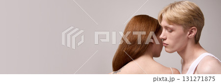 Couple close side portrait with emotional connection 131271875