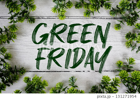 Green Friday text with artificial leaf decoration on wooden background Green Friday text with artificial leaf decoration on wooden background 131271954