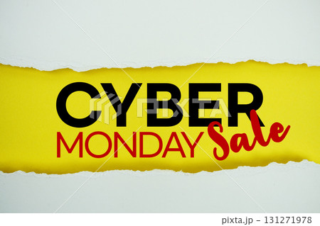 Cyber Monday text on yellow with white paper torn ripped of horizontal Cyber Monday text on yellow with white paper torn ripped of horizontal 131271978
