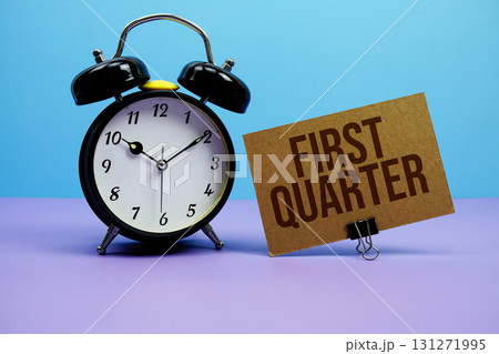 First Quarter text with alarm clock on blue and purple background First Quarter text with alarm clock on blue and purple background 131271995