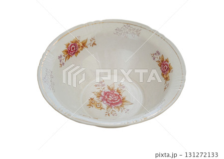 Plate with a pattern of flowers isolated on a white background. Ceramic tableware. Porcelain kitchenware. 131272133