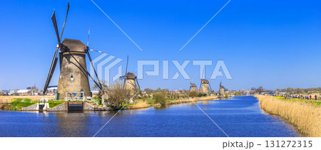 traditional Holland - Windmills in Kinderdijk village traditional Holland - Windmills in Kinderdijk village 131272315
