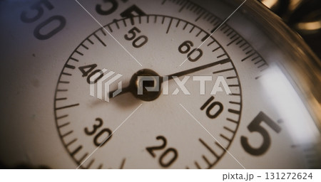 Time Lapse: Macro Close Up Shot of Mechanical Stopwatch with Metallic Case and Clear Dial 131272624