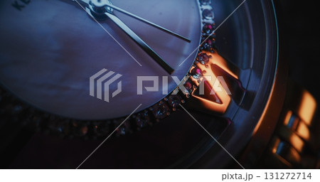 Elegant Wristwatch with Gemstone Bezel and Metallic Bracelet in Macro Close Up Shot. Time Lapse 131272714