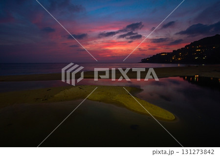 sweet pink sky at sunset reflection in the beach puddle. 131273842