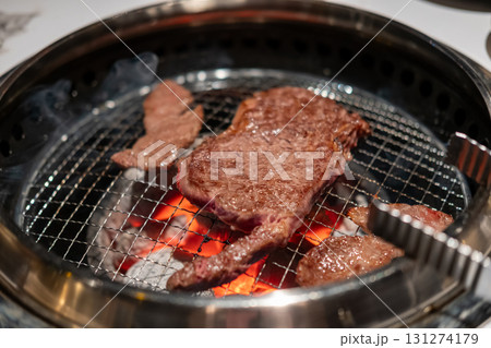 Sirloin Hanwoo Beef, marbled Korean Style Meat on the Grill. BBQ rare meat with soft focus Sirloin Hanwoo Beef, marbled Korean Style Meat on the Grill. BBQ rare meat with soft focus 131274179