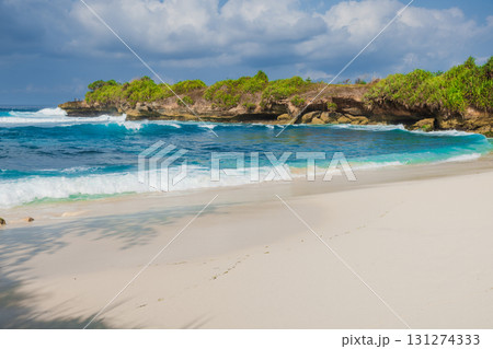 Tropical beach with blue ocean in Lembongan, Indonesia Tropical beach with blue ocean in Lembongan, Indonesia 131274333