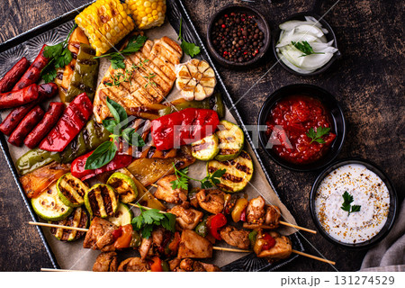Assortment of grilled bbq meat and vegetables Assortment of grilled bbq meat and vegetables 131274529