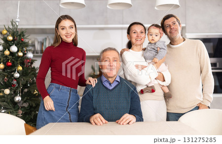 Portrait of large family of different generations celebrating Christmas together at home 131275285