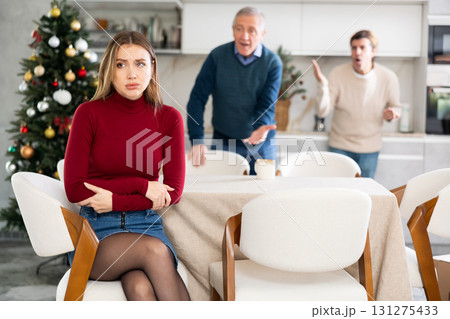 Men quarreling with girl 131275433