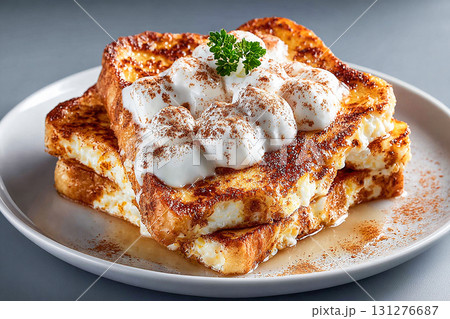 Egg-based breakfast. French toast with egg whites and cinnamon. Healthy indulgence. High protein breakfast. Menu design. Egg-based breakfast. French toast with egg whites and cinnamon. Healthy indulgence. High protein breakfast. Menu design. 131276687