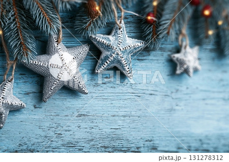 Christmas, New Year home decor. Empty white wall mock up with green fir branches in a vase on a white table. Mock up for displaying works 131278312