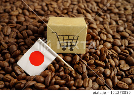 Japan flag with shopping cart box on coffee beans, shopping online for imxport xmport. Japan flag with shopping cart box on coffee beans, shopping online for imxport xmport. 131278859